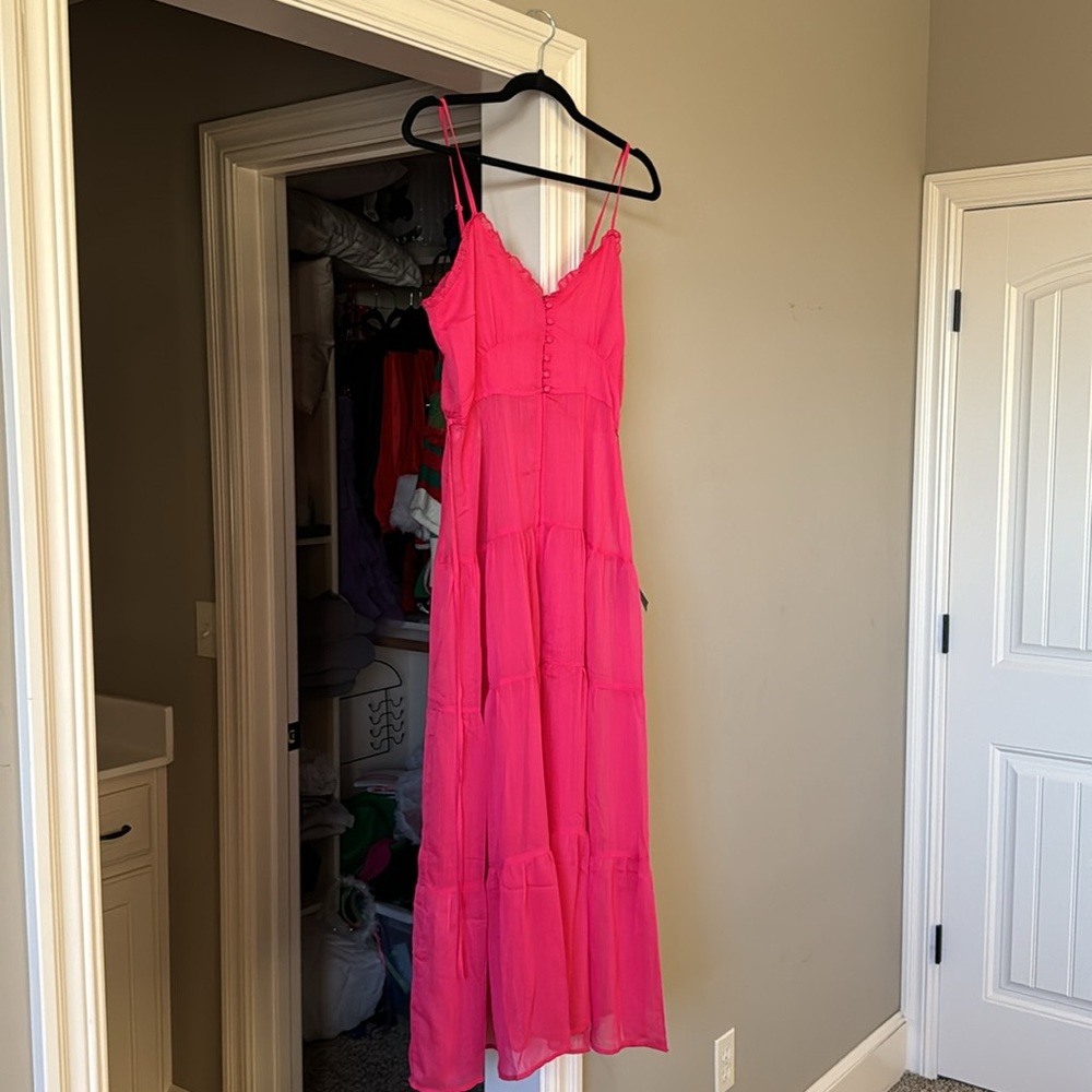 Dress from Lulu’s that opens up in the front and is see through. Wear with skirt